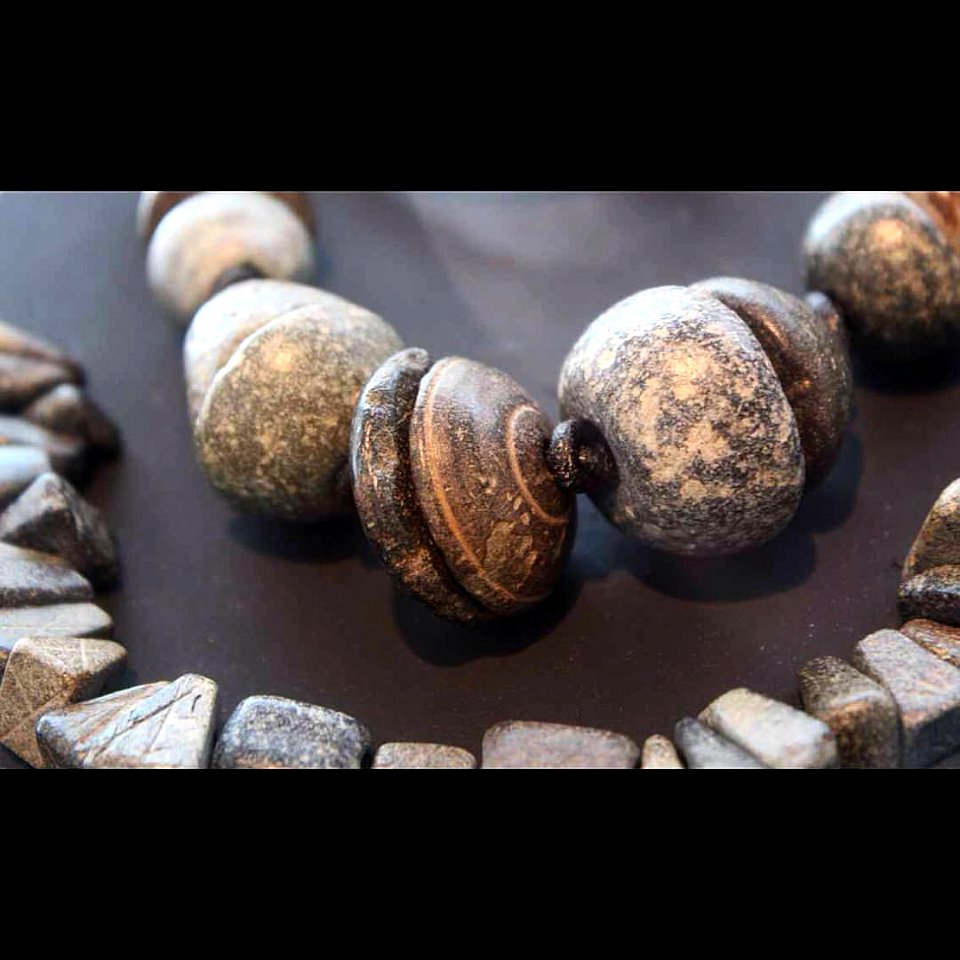 Prehistoric necklace  Badarian Period c. 4000 BC  The jewellery of Egyptian prehistory strikes us with its beauty, combining elements like shells, tusks and beads made of different stones (limestone, basalt, alabaster or greywacke)  @Museu Egipci  #Barcel