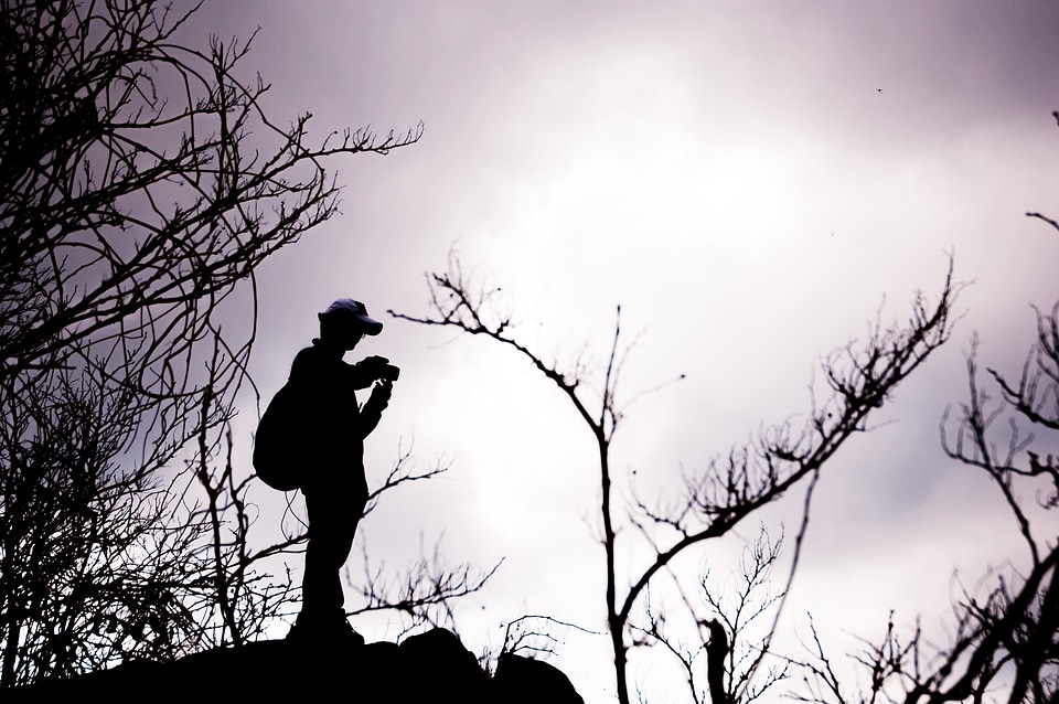 Tourism mountaineer silhouette