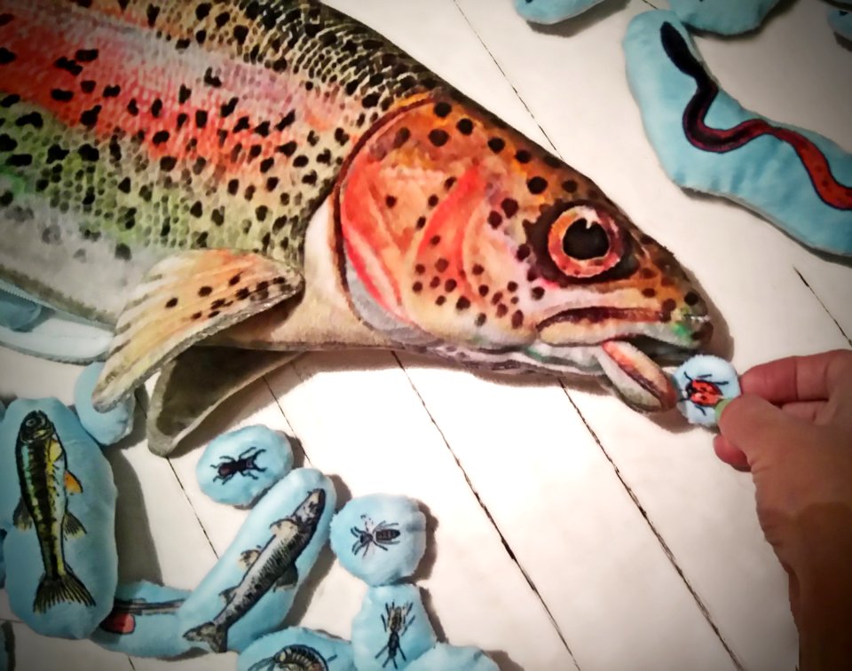 trout plush with its plush food