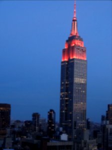 New York. The Empire State lights at dusk from wedding reception venue. photo