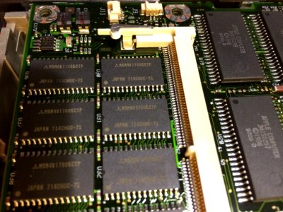 Powerbook 2400 take apart. It has a green light when I power it on. After putting it back together the issue persists.