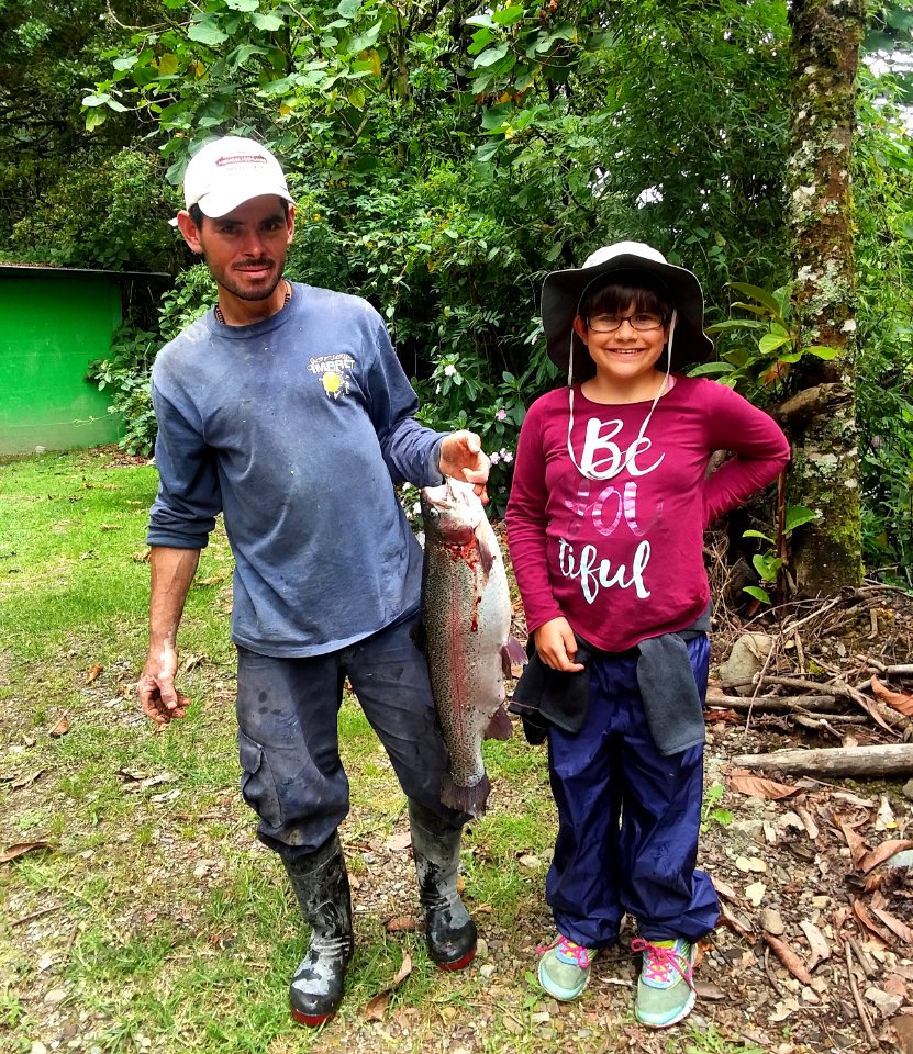 Marino asked his trout farmer friend to let Maisie net a trout for our supper. It's huge! About 10lbs
