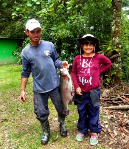 Marino asked his trout farmer friend to let Maisie net a trout for our supper. It's huge! About 10lbs