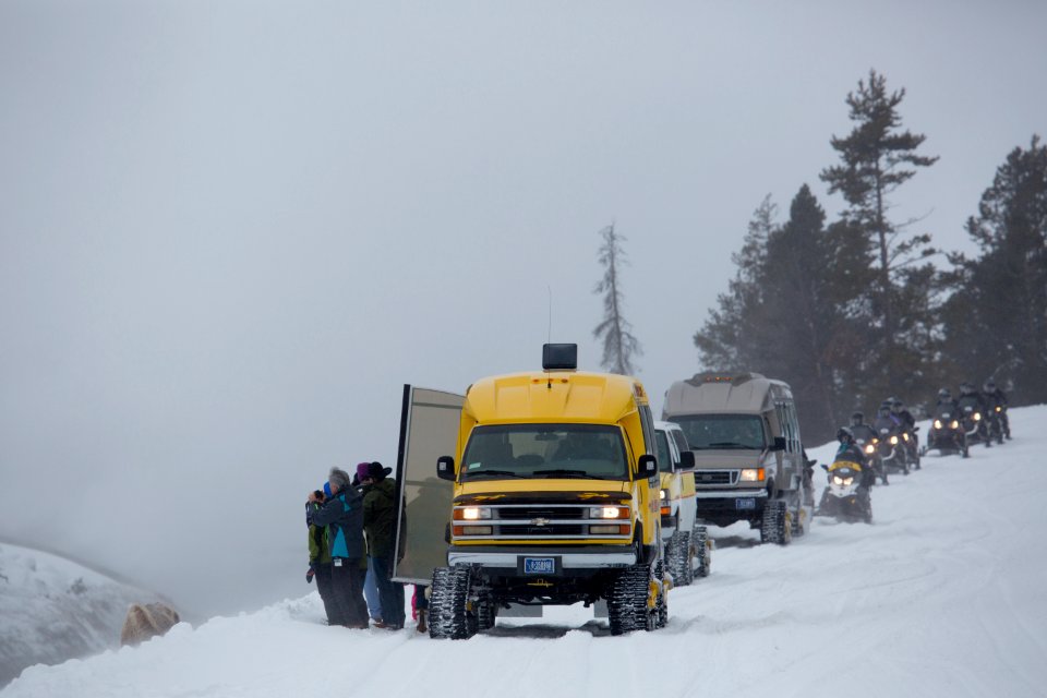 Snowcoach and snowmobile tours near Midway Geyser Basin