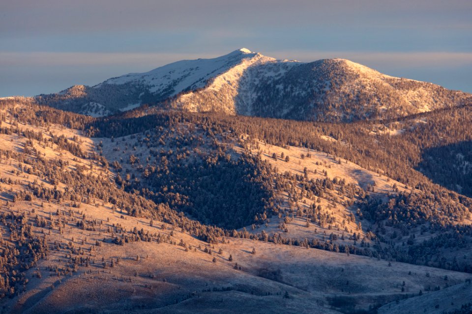 First light on Sheep Mountain after a fall snowstorm