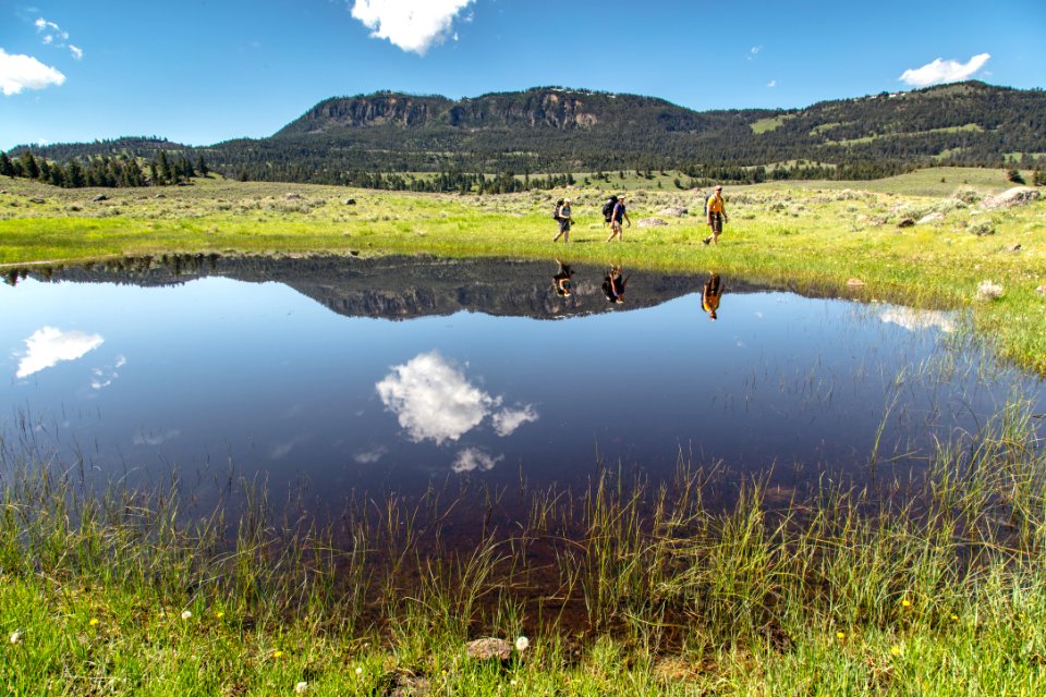 Backpackers near an ephemeral pool on the Hellroaring Creek Trail