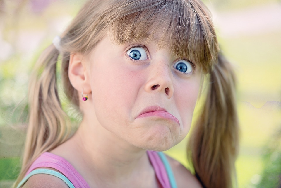 Girl blond making a face
