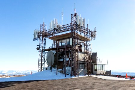 Mount washburn Fire Lookout with communication infrastructure photo