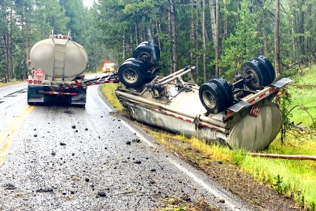 Overturned commercial motor vehicle tandem trailer