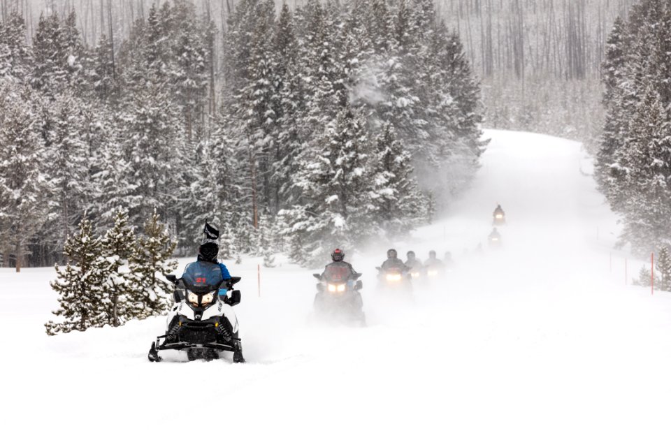 Snowmobile tour headed to the Canyon Village Area photo