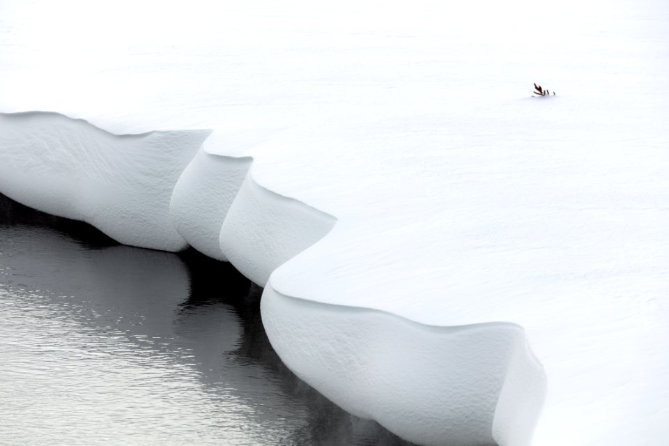 Deep snow along the bank of the Gibbon River