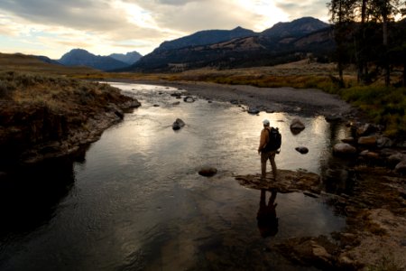 Hiker along Soda Butte Creek photo