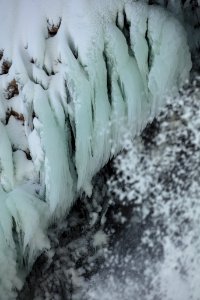 Ice forming along the walls of Lower Falls photo