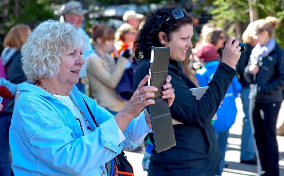 Visitors photographing at Canyon