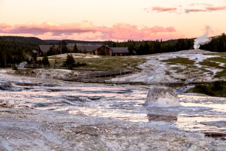 Beehive Geyser cone at sunset photo