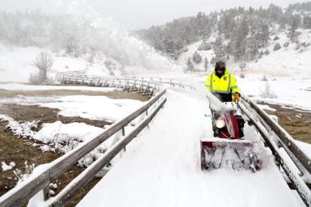 Clearing snow off the boardwalks at Mammoth Hot Springs photo