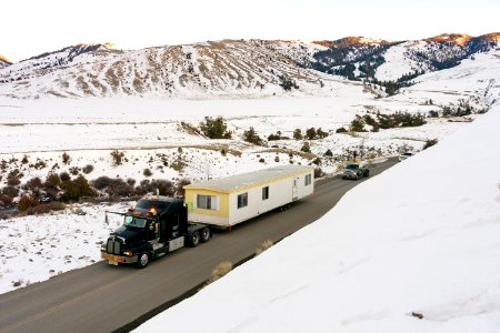 Outdated employee housing trailer being removed from Yellowstone photo