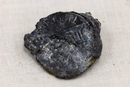 Ear Spring ejecta - penny imprint on sinter