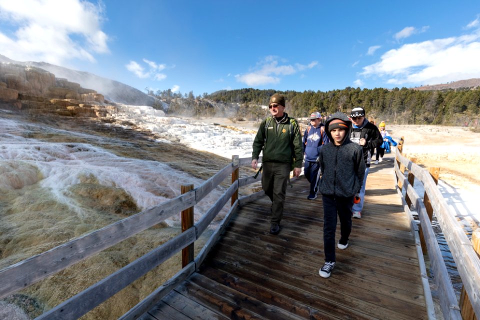 Ranger Mike leads a school group on the Mammoth Hot Springs boarkwalks