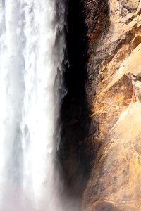 Lower Falls water and rock (portrait) photo