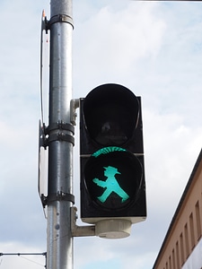 Traffic signal green males photo
