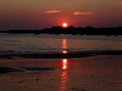 Soleil couchant sur la plage