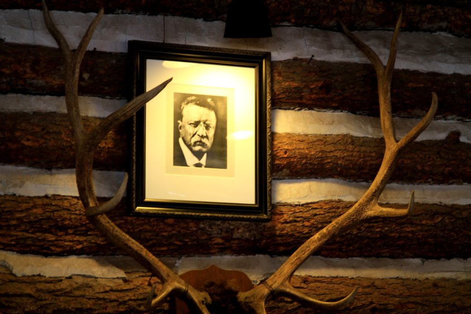 Roosevelt Lodge, photo of Teddy Roosevelt on wall above elk antlers