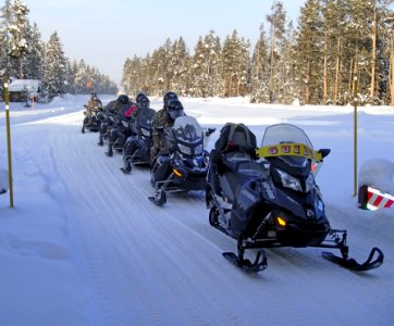 Snowmobiles entering West Gate photo