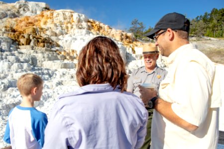 Dan Wenk chats with a family near Palette Springs photo