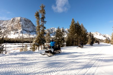 Snowmobile group along the Madison River