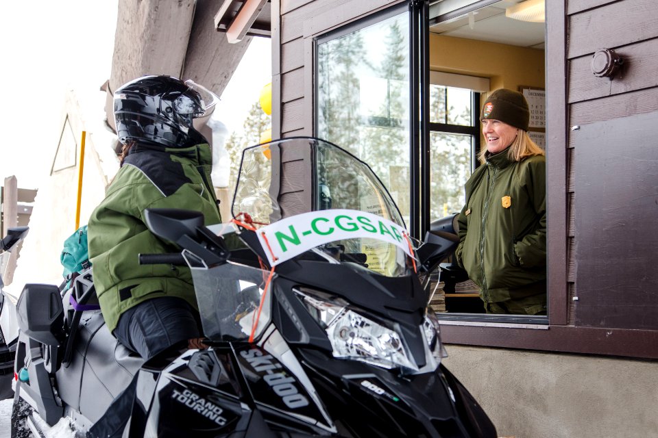 Snowmobiler at West Yellowstone Entrance station (3) photo