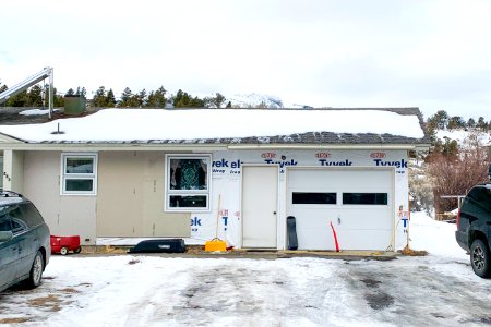 Replacing siding on non-historic employee housing