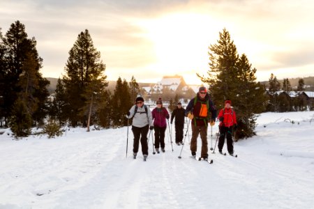 Skiers head out to Castle Geyser at sunrise photo