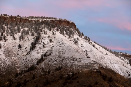 Pink clouds over Mt. Everts after a snow storm photo