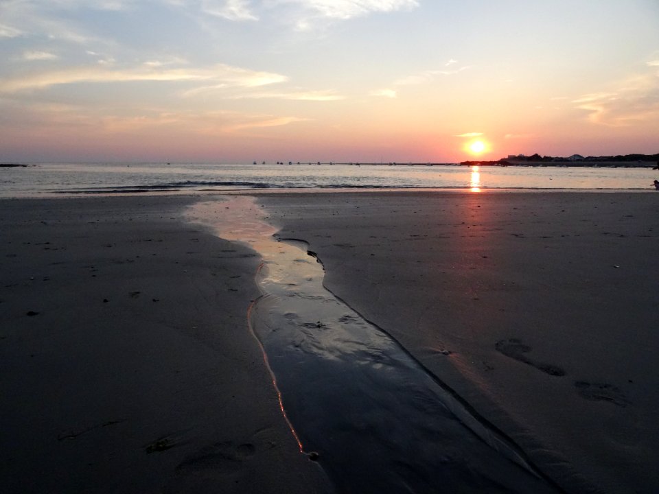 Soleil couchant sur la plage
