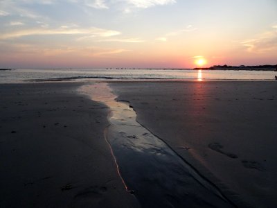 Soleil couchant sur la plage