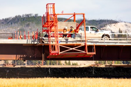 Pelican Creek Bridge project: installing railings