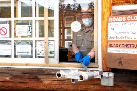 Ranger Don demonstrates a new extendable arm prototype at the South Entrance photo