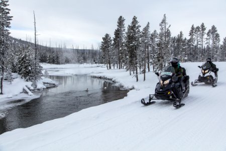 Snowmobilers near Gibbon RIver photo