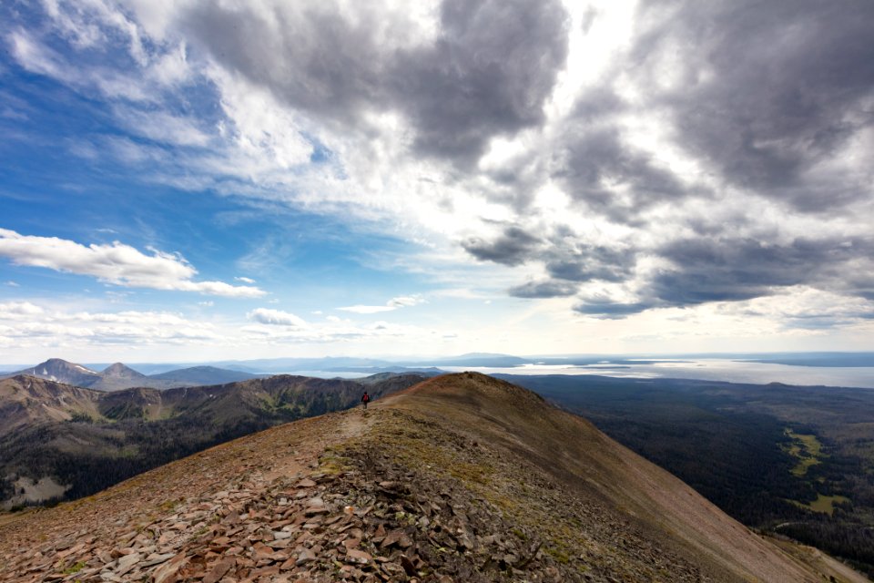 Hiker headed down from the top of the Avalanche Peak Trail as a storm approaches