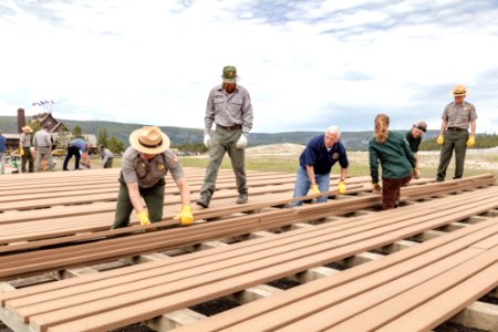 Vice President Mike Pence works with Yellowstone Superintendent Cam Sholly on the Old Faithful boardwalk construction project