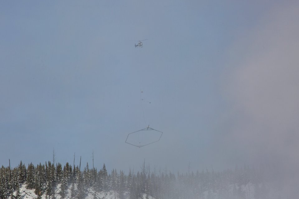 Subsurface survey helicopter flies near the Upper Geyser Basin