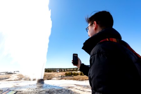 Photographing a Beehive Geyser eruption photo