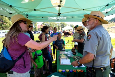 Ranger Fred hands out supplies for the "Wildlife Olympics" photo