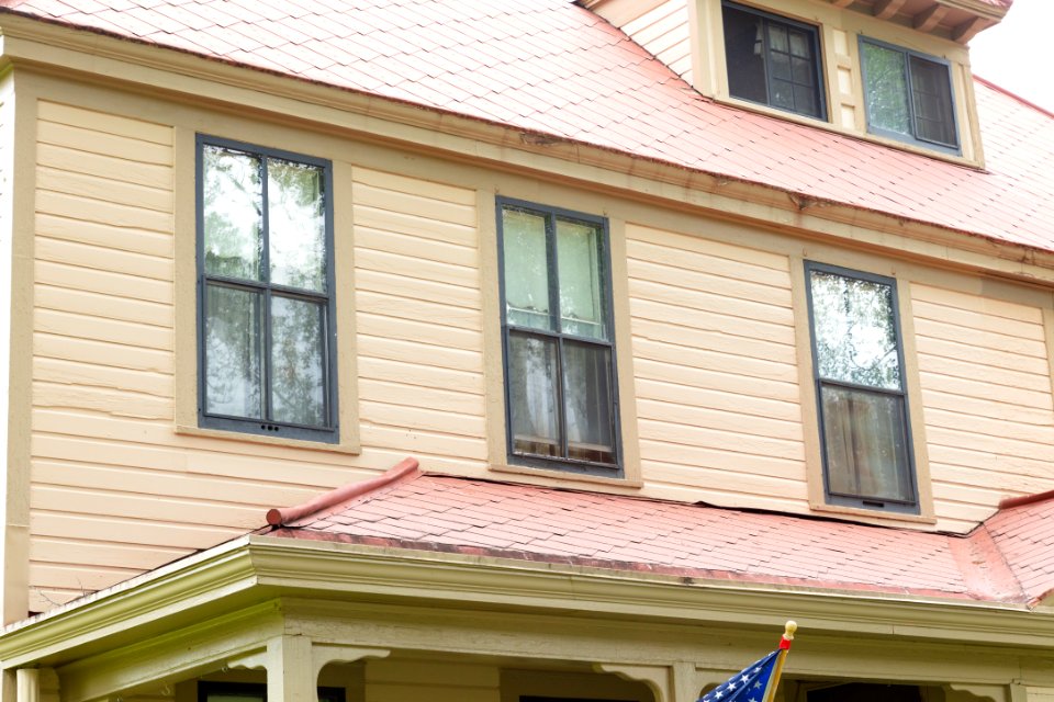 Historic housing exterior comparisons: fresh paint detailed front view