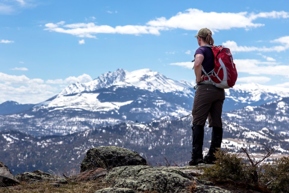 Hiker on Dome Mountain looking at Electric Peak