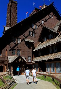 Old Faithful Inn, visitors walking into the Inn photo