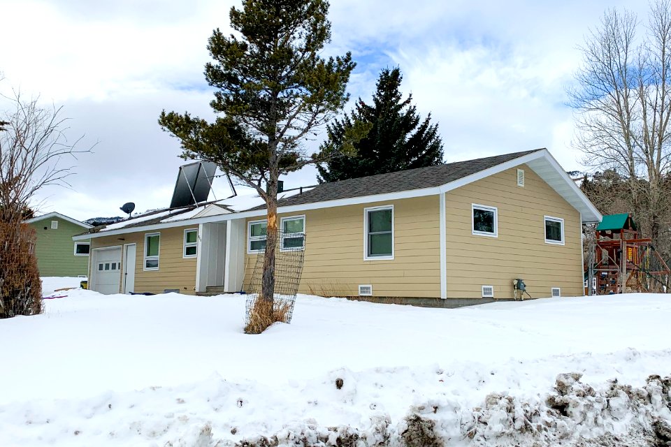 New siding installed on non-historic employee housing