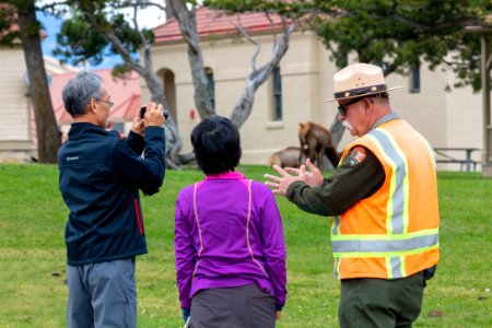 Ranger Kelly talks to people about elk in Mammoth