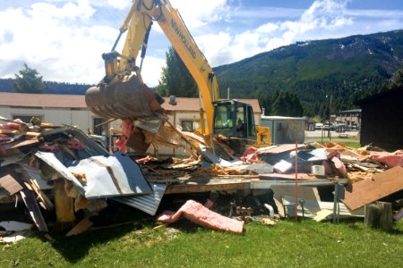 Demolishing outdated seasonal employee housing trailer